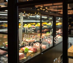 The Butcher Block, a space in Carve American Grille displays prime cuts of meat available for diners